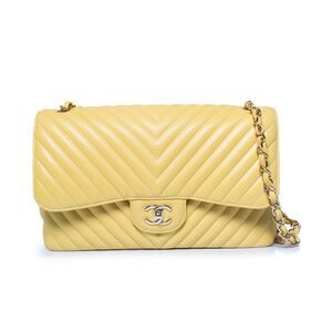 Chanel, Jumbo yellow chevron lamb leather flap bag